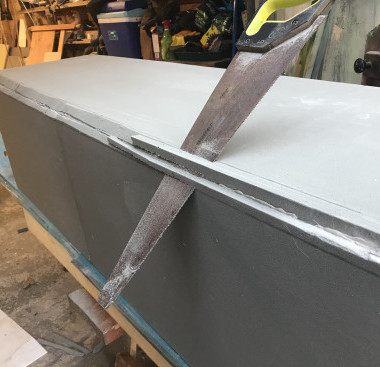 Main hull is now turned over and the external corners I.e. chines, rounded and glassed.